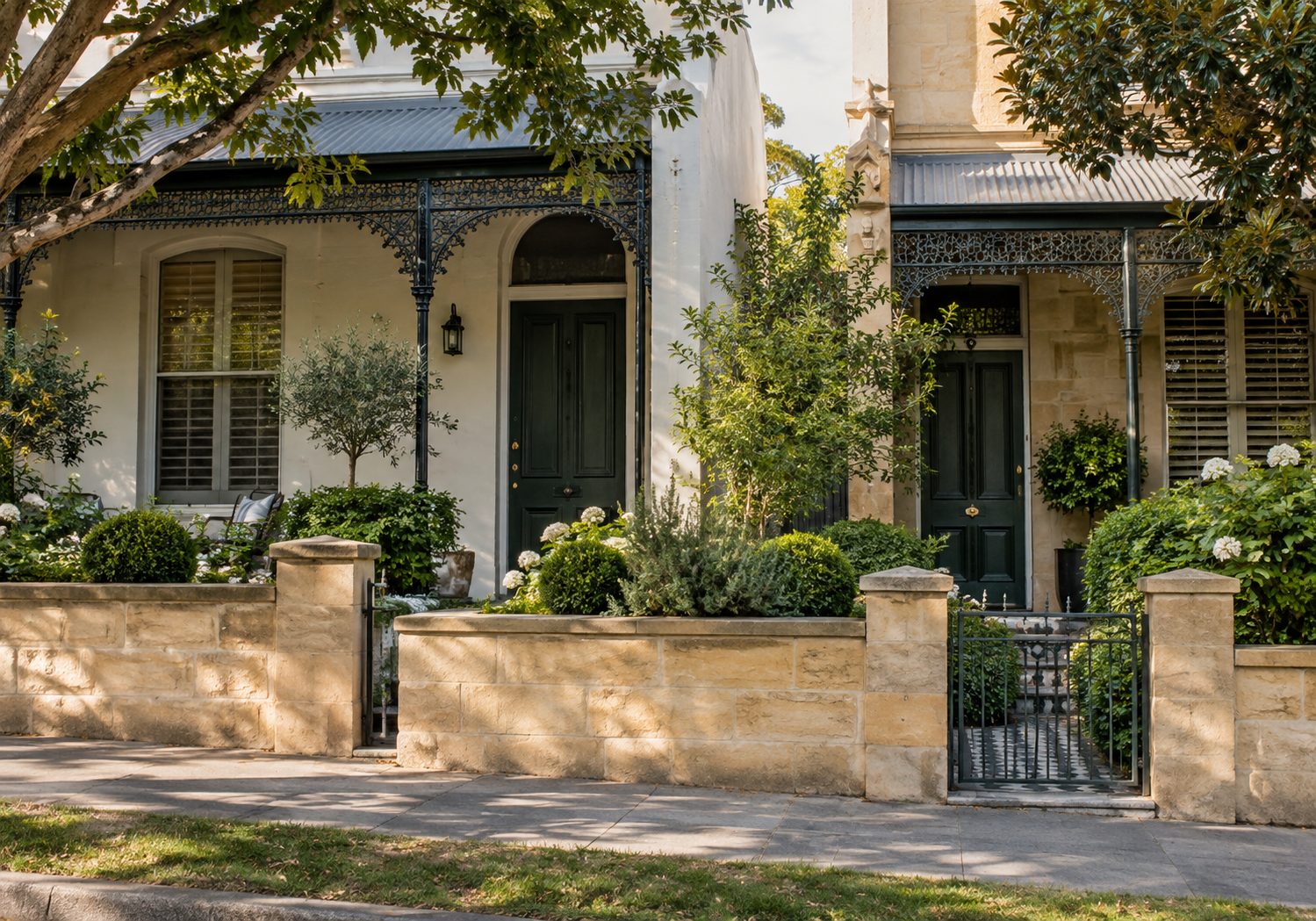 Illustration of two adjoining terrace houses sharing a low sandstone boundary wall and planted front gardens.